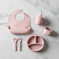 Flat lay of silicone baby cutlery set